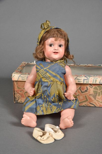 null "Parisette" (?) celluloid doll marked with an eagle's head "FRANCE 45", brown...