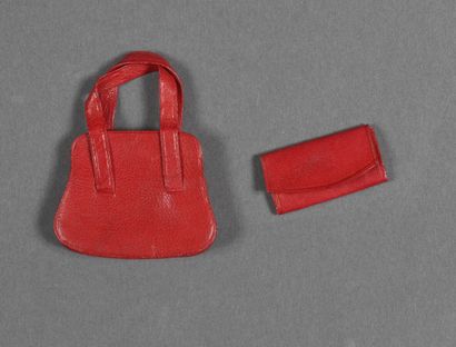 null Sac à main cuir rouge à 2 anses 4,5x5,5cm + pochette intérieure assortie 2x4cm.

Provient...