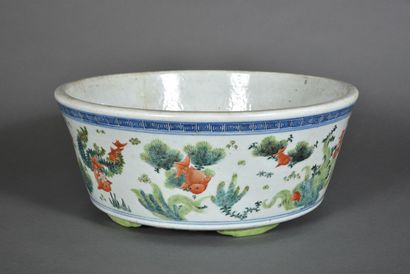 null Porcelain planter with a wide flat bottom and a slightly flared wall, decorated...