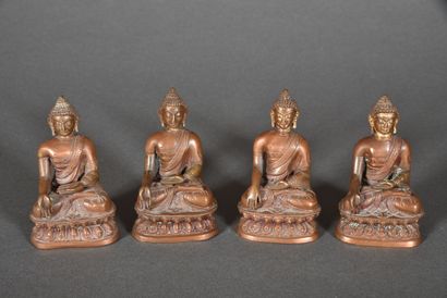 Suite of four small Buddhas in bronze with...