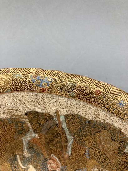 null Satsuma stoneware bowl in polychrome and gold, the wall and the rim flared to...