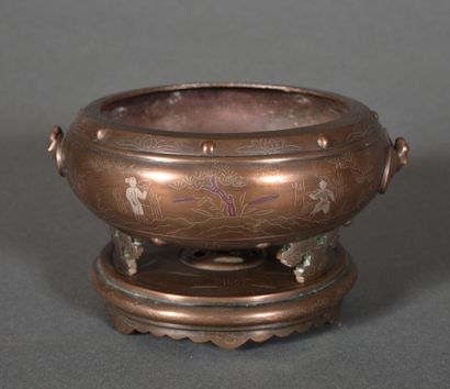 Bronze incense burner with a slightly coppery...