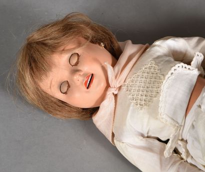 null Blonde doll with bakelite head, blue sleepy eyes, open mouth, slight smile,...