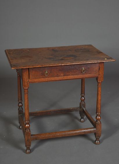 null Small oak table, opens with a drawer in front, turned legs and ringed, connected...