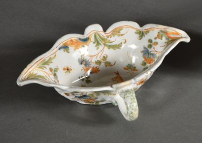 LYON. 
Oval earthenware sauceboat with two...