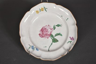 null STRASBOURG.

Plate with contoured edge in earthenware with polychrome decoration...