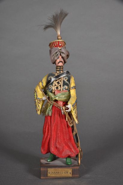 null MARCEL RIFFET FIGURINE.

Lead figurine, Officer of Mameluk of the Guard, label...