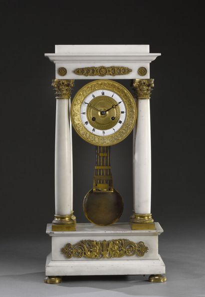 null Portico clock in white marble with four columns decorated with capitals and...