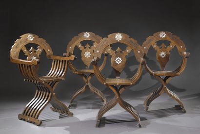 null Four Syrian armchairs of curule type with back in semi-circle out of carved...