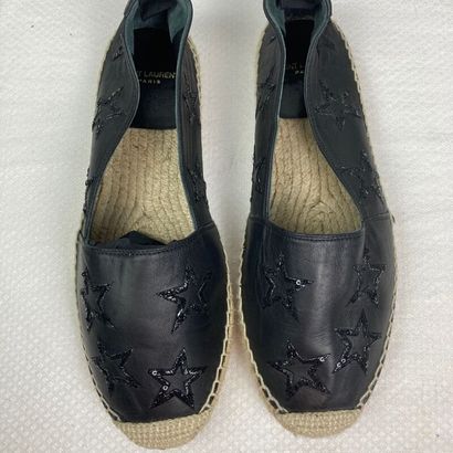 null SAINT LAURENT Paris. Pair of espadrilles in black leather embroidered with glittering...