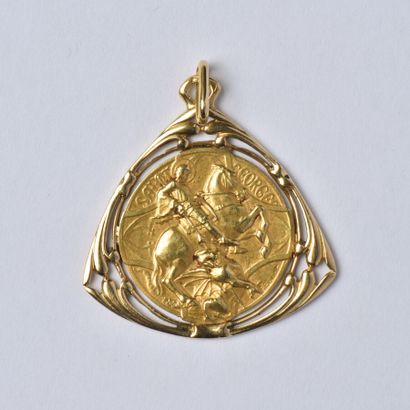 null Médaille Religieuse en or jaune 18K (750/oo) de forme trilobée ajourée, la face...