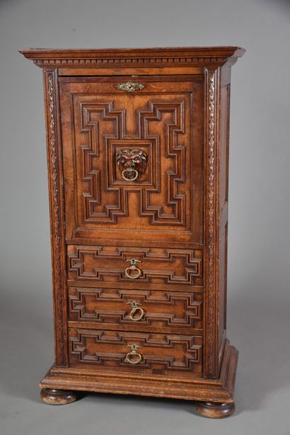 Flemish style molded oak cabinet with carved...