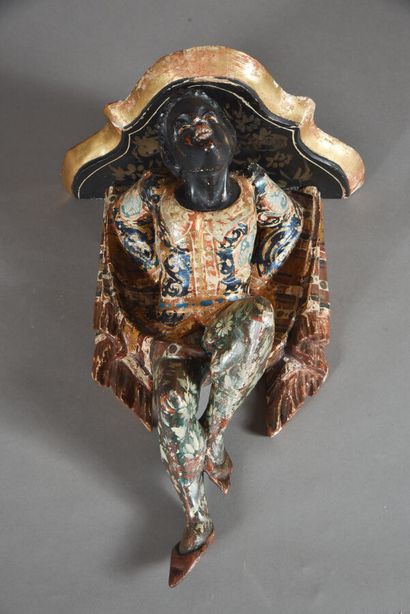 null Wall bracket in carved wood, polychromed, gilded representing a Moor holding...