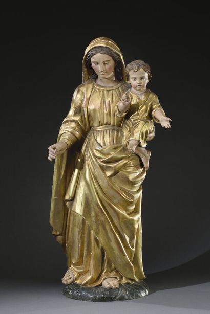 null Virgin with the child blessing. 
Group in carved wood, gilded and polychromed....