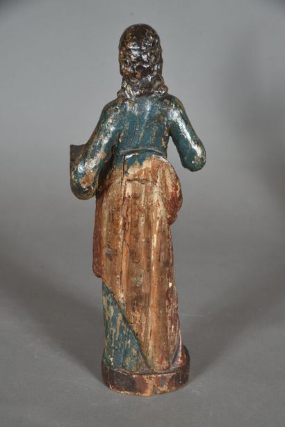 null Teaching Christ, polychromed wood sculpture, representing Christ holding a book....
