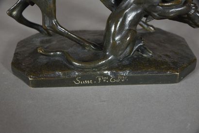 null Barye (After). 
Stag attacked by a feline. Bronze with brown patina. Signed...