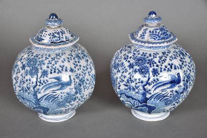 null DELFT in the style
Pair of covered vases of ovoid form with cut sides, decoration...