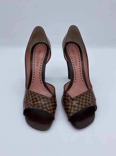 null LOUIS VUITTON. Pair of open-toe slingbacks in ebony patent leather, on 11cm...