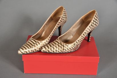 null CHARLES JOURDAN. Pair of copper pumps, reptile style, 8.5cm heel. Size 40. With...