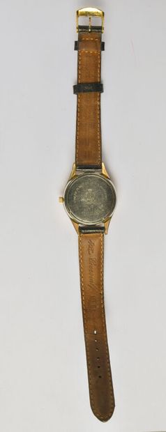 null LIP: Steel and gold-plated metal watch, round dial with cream background, applied...