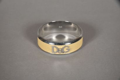 D&G. Bracelet jonc en cuir beige façon reptile...
