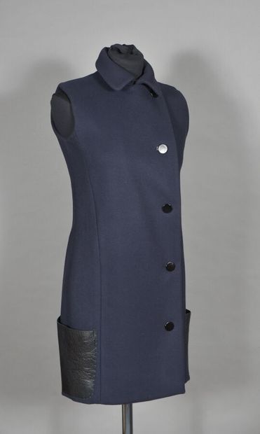 null Celine. Sleeveless coat dress in navy drape and two patch pockets in black leather,...