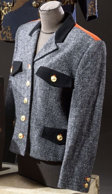 null Versus Gianni Versace. Double-faced jacket in grey mottled wool and orange velvet,...