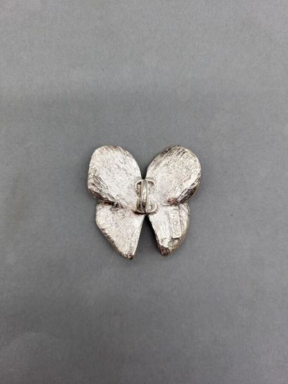 null Yves Saint Laurent made in France. Silver plated butterfly pendant with four...