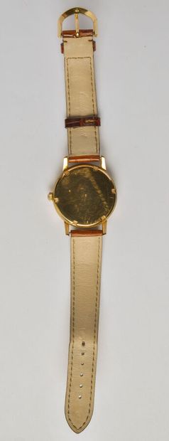 null LONGINES: Watch in 18K yellow gold (750/oo), round dial with silvered background...