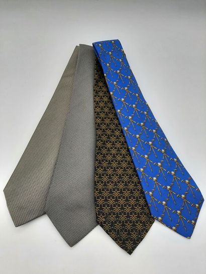 CHANEL. Blue silk tie with yellow polo mesh...