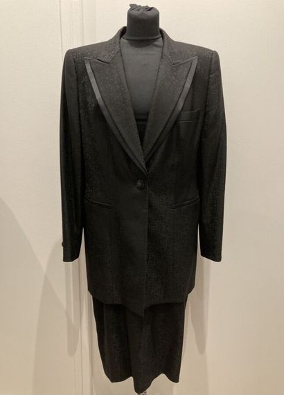 null ESCADA by Margaretha Ley.
Suit in black wool gabardine stamped with the initials,...
