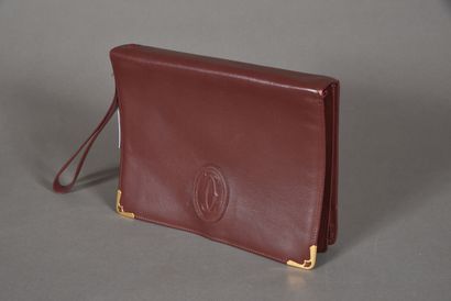 CARTIER. Small document holder in burgundy...