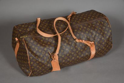 null LOUIS VUITTON.
Keepall 70 duffel bag in Monogram canvas and natural leather,...