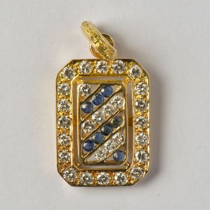 An 18K (750/oo) yellow gold pendant of rectangular...