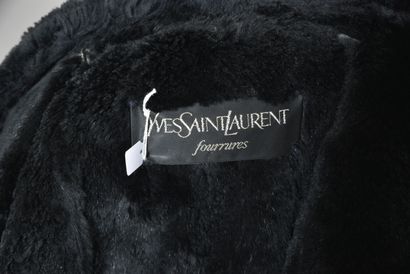 null Yves Saint Laurent furs. Black canvas and suede pea jacket with fringed edges,...