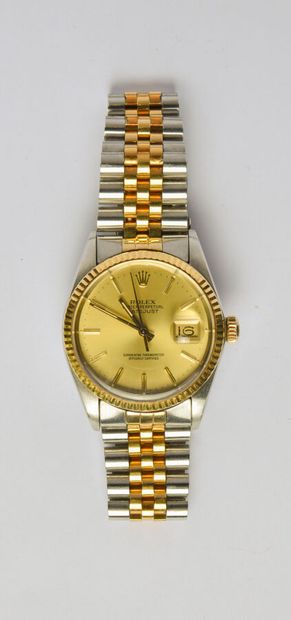 ROLEX: Steel and 18K (750/oo) yellow gold...