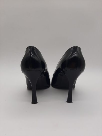 null LUCIANO PADOVAN. Pair of pumps, black glazed leather, vamp with belt buckle,...