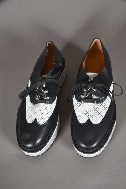 null CLERGERIE, Fall/Winter 2019.
Pair of derbies in black leather and perforated...