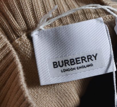 null BURBERRY. Pull en jersey laine Merinos beige, à rayures bleu ciel, bande blanc/noir...