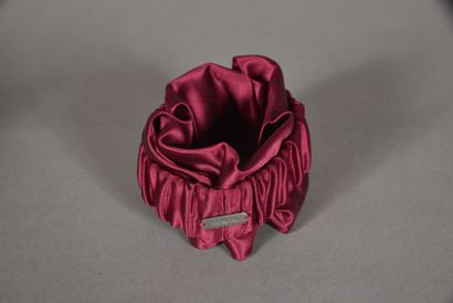 null PRADA. Duchess Show bracelet in plum silk satin, signed with gathers under elastic....