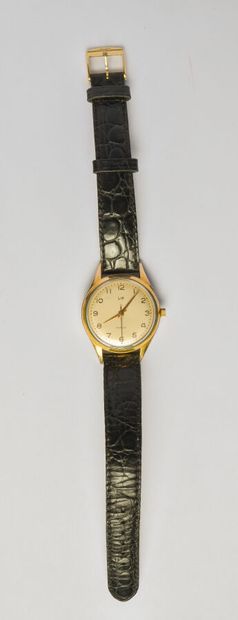 LIP: Steel and gold-plated metal watch, round...