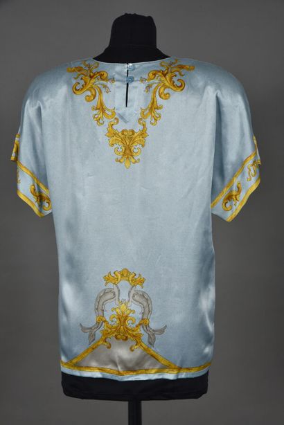 null ESCADA by Margaretha Ley. Sky blue silk top printed with arabesques and golden...