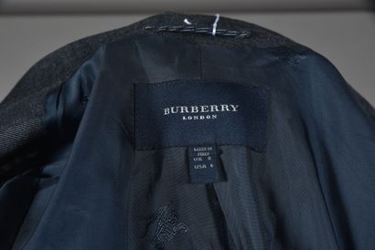 null BURBERRY. Raw denim jacket, collar on visible zipper, asymmetrical left under...