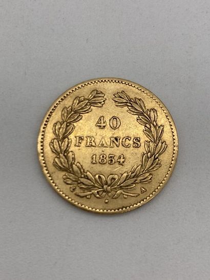 null Pièce en or 40 francs datée 1834 Louis Philippe.
LOT VENDU SUR DESIGNATION,...