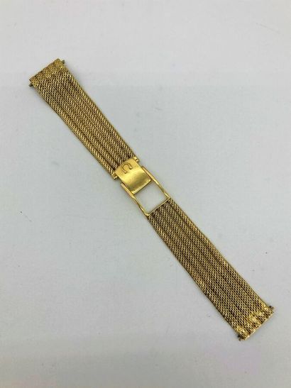 null Bracelet OMEGA en or 18K. 
Modèle slimline. 
Entrecorne : 20 mm 
Poids brut...