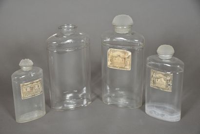 null COTY, 1920s
Three colorless pressed glass bottles with their frosted glass stopper...