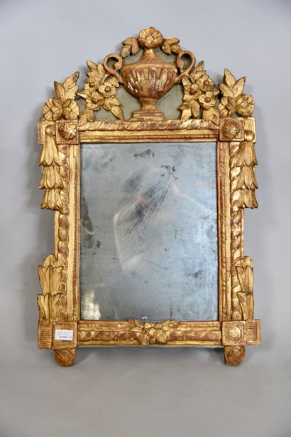 null Small mirror in carved wood, gilded, ribbon frame, laurels, antique urn pediment...