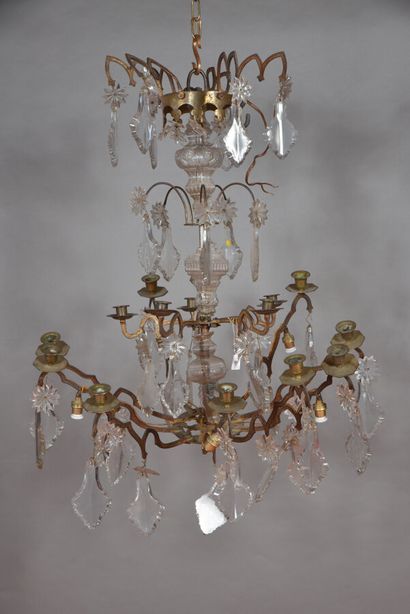 Brass chandelier with fifteen arms of light...