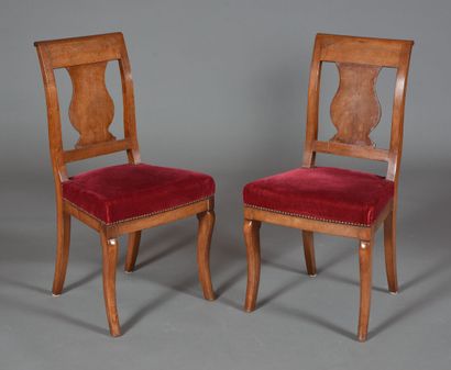 null Pair of walnut chairs with openwork backs, trimmed with a central bar cut into...