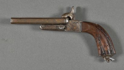 null Double octagonal tilting barrel chest pistol marked, hammers on top, ring on...
